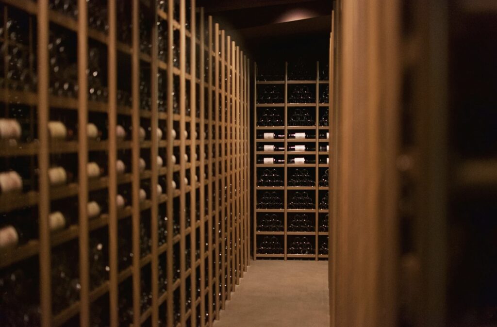 Bottles stacked in wine storage